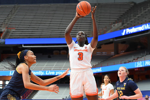 Maeva Djaldi-Tabdi towers above Pittsburgh's defense in a shot attempt at the Carrier Dome on Sunday. 